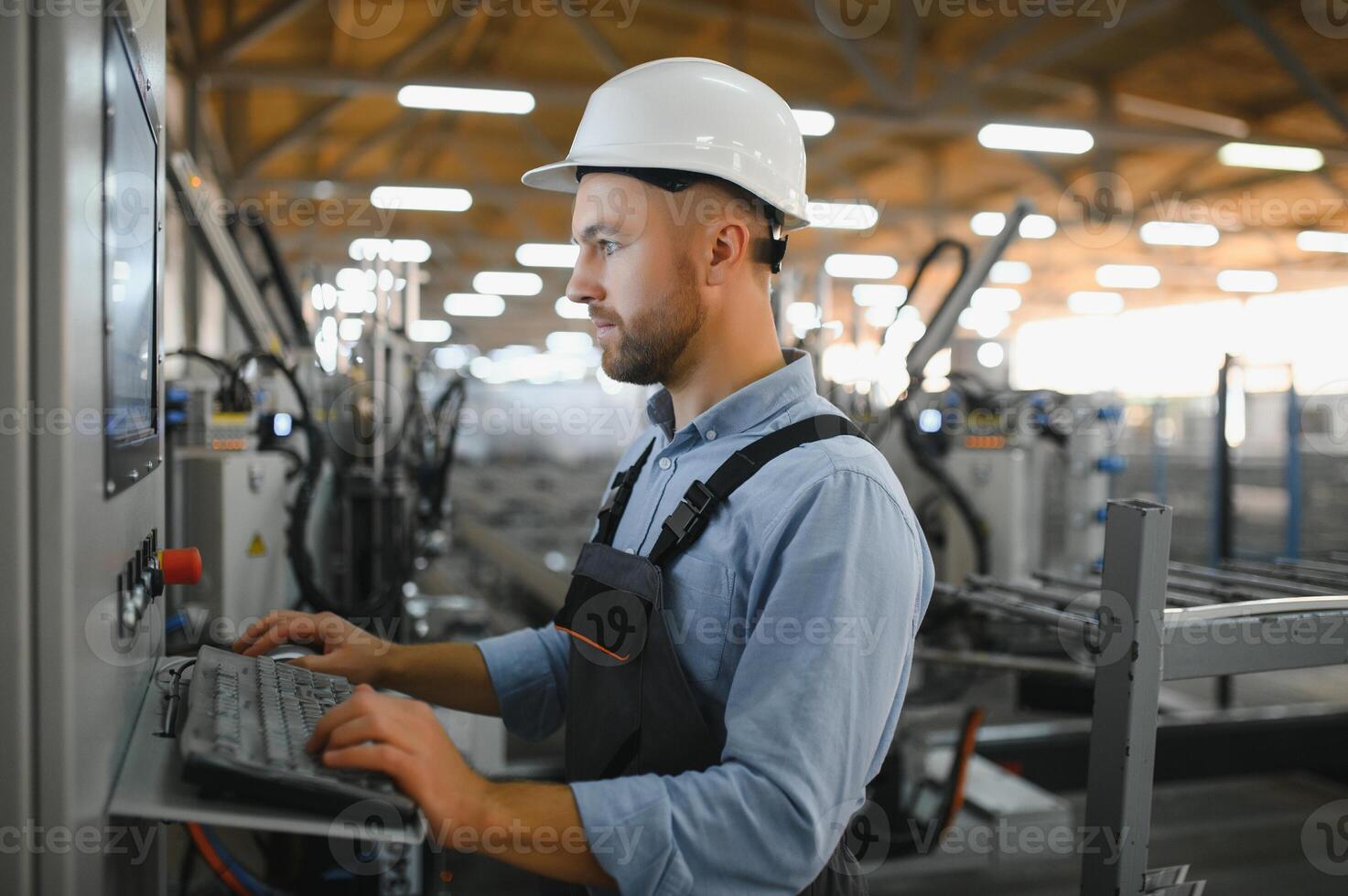 Smart factory worker or engineer do machine job in manufacturing workshop . Industry and engineering concept . photo