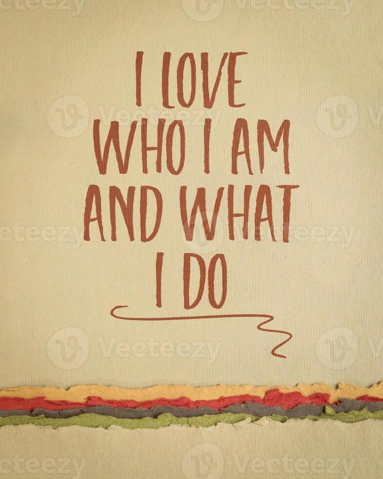 I love who I am and what I do - positive affirmation words on art paper, vertical poster photo