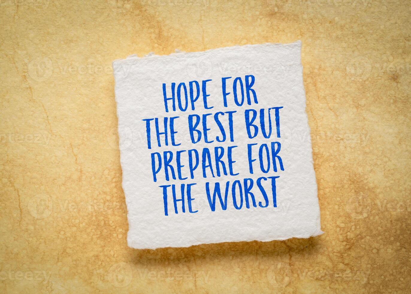 Hope for the best but prepare for the worst - inspirational note on art paper photo