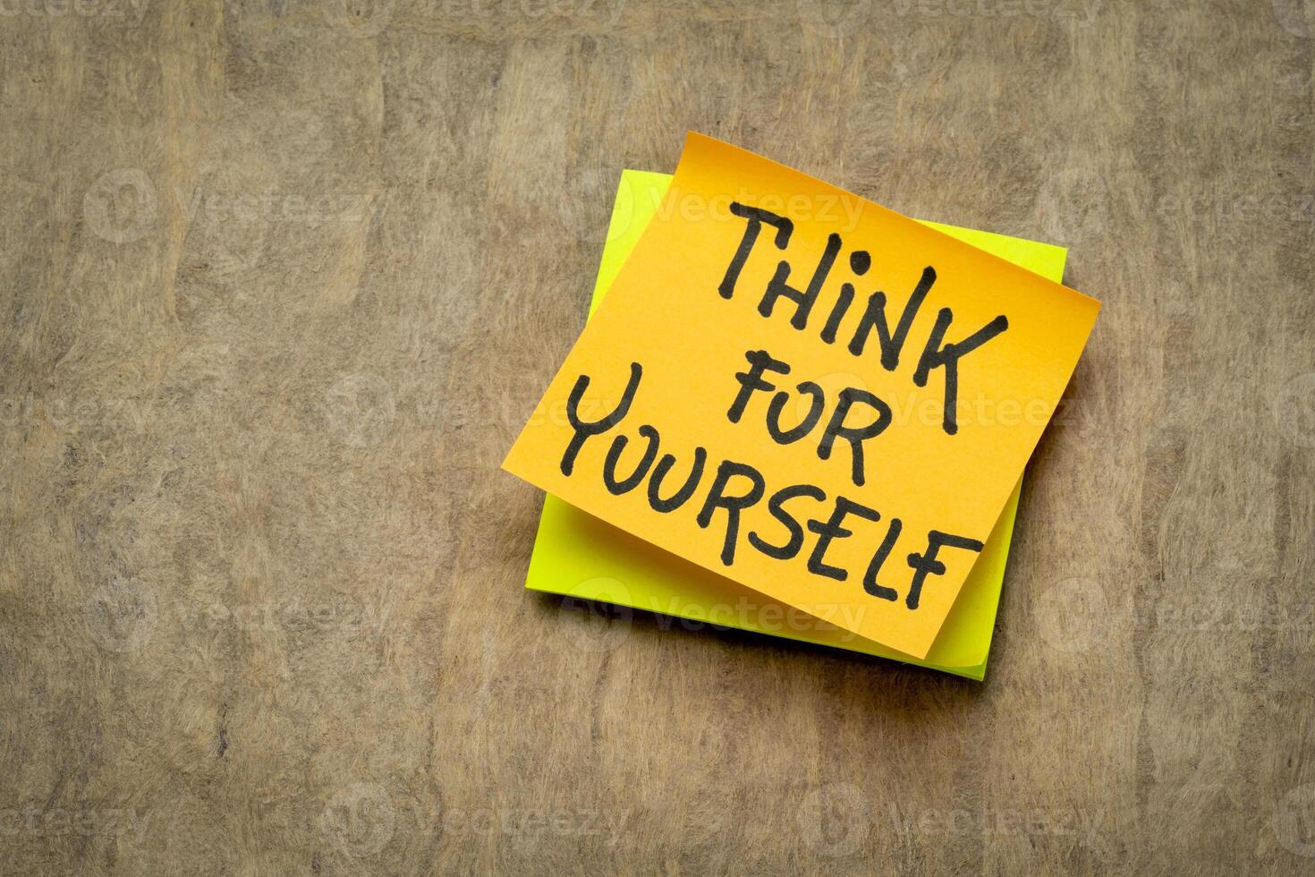 Think for yourself reminder or advice - handwriting on a sticky note, personal development concept photo