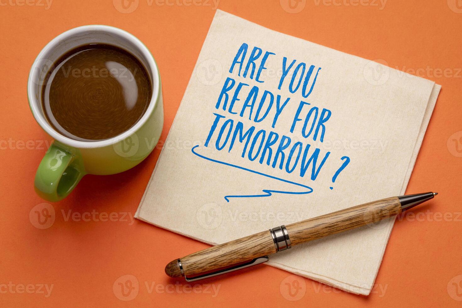 Are you ready for tomorrow question - handwriting on a napkin with a cup of coffee. Business and personal development concept. photo