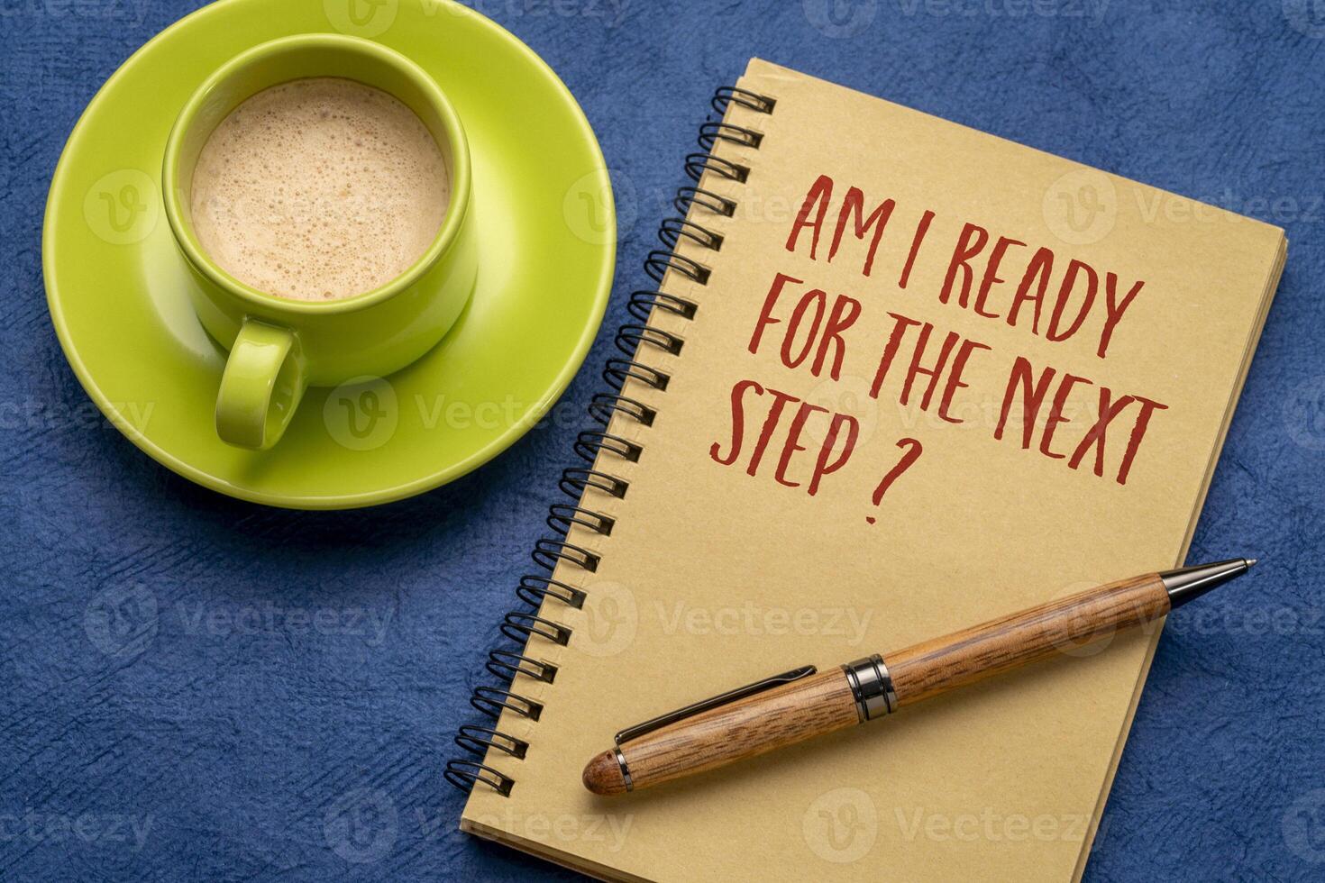 Am I ready for the next step. Self reflection question in a notebook. Personal development or career concept. photo