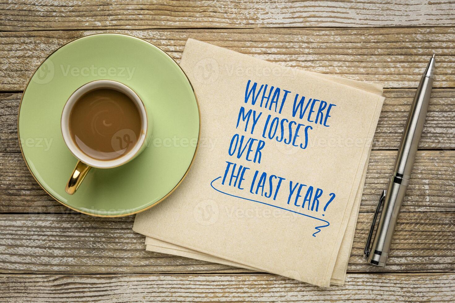 What were my losses over the past year. Self reflection question on a napkin. Review of failures in the past year. photo