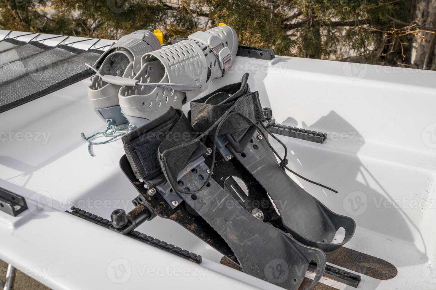 cockpit of a coastal rowing shell with velcro straps foot stretcher to be replaced by rowing boots photo