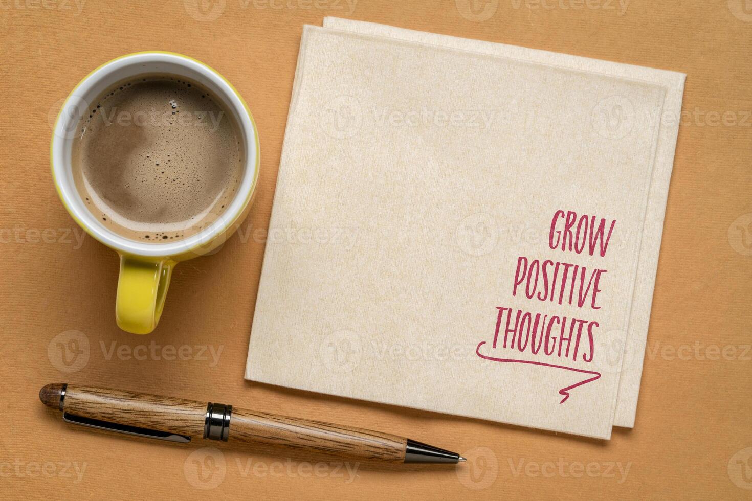 Grow positive thoughts - inspirational note on a napkin with a copy space, mindset and positivity concept photo