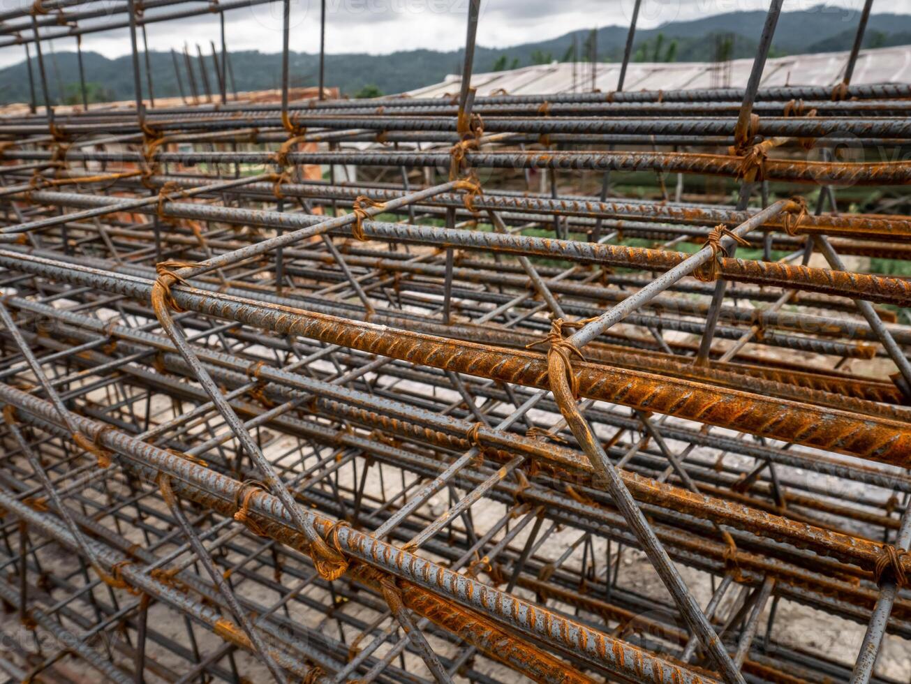 Neatly arranged concrete iron is ready to be used as a foundation for a large building photo