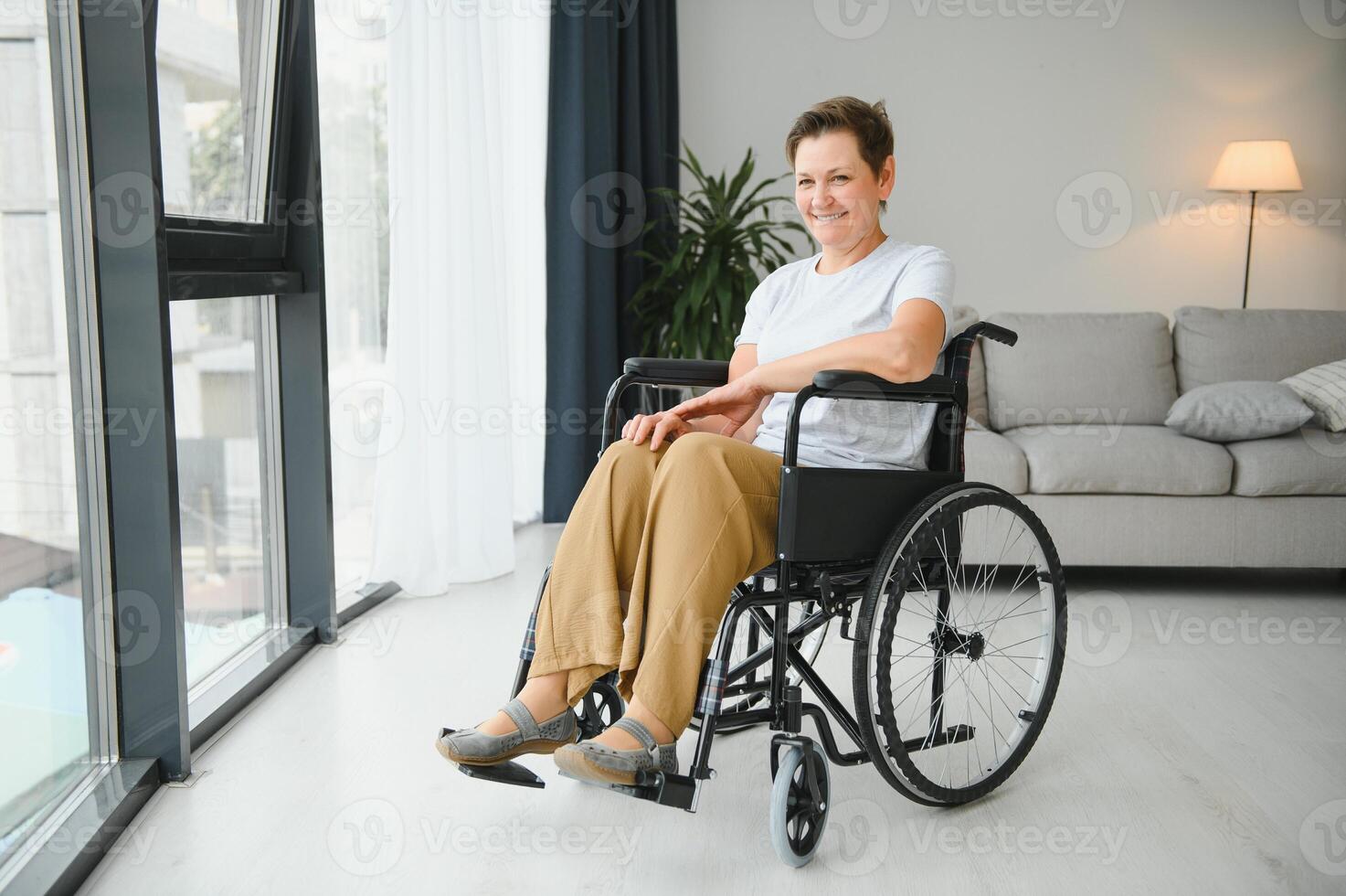 Senior woman on a wheelchair photo