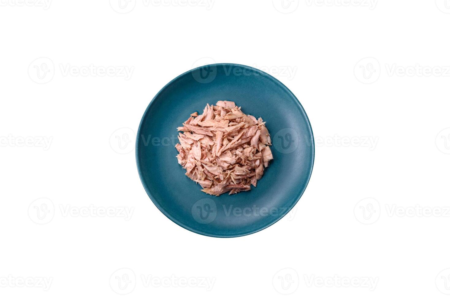 Delicious canned dietary tuna meat with salt, spices and oil photo