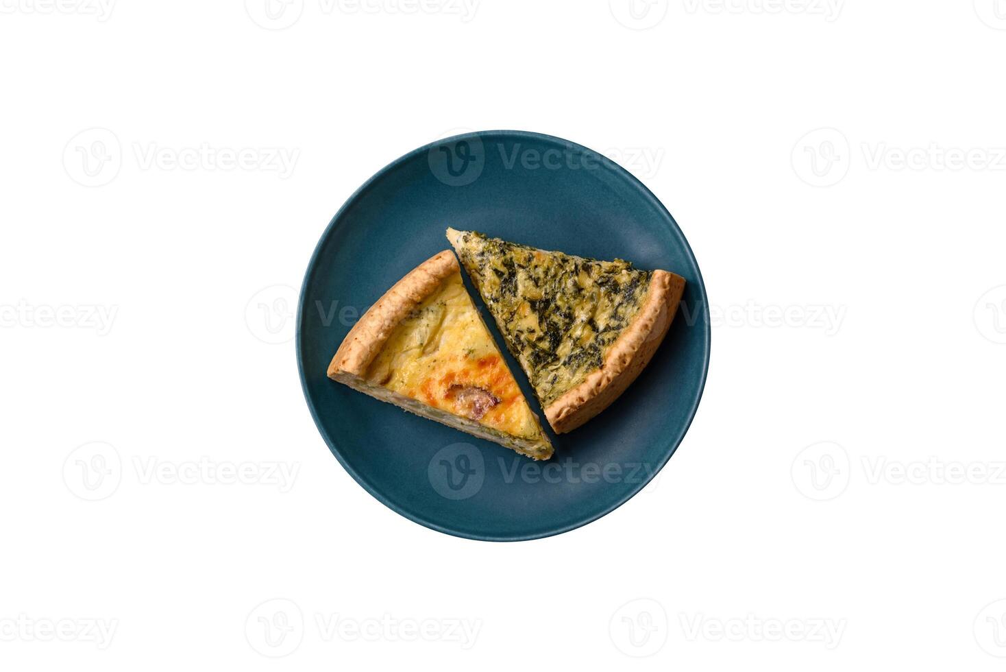 Delicious crispy quiche cut into slices with cheese, broccoli, tomatoes photo