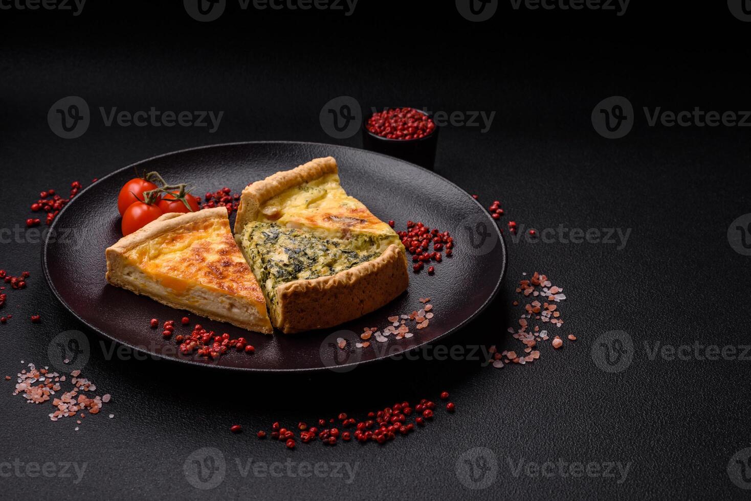 Delicious crispy quiche cut into slices with cheese, broccoli, tomatoes photo