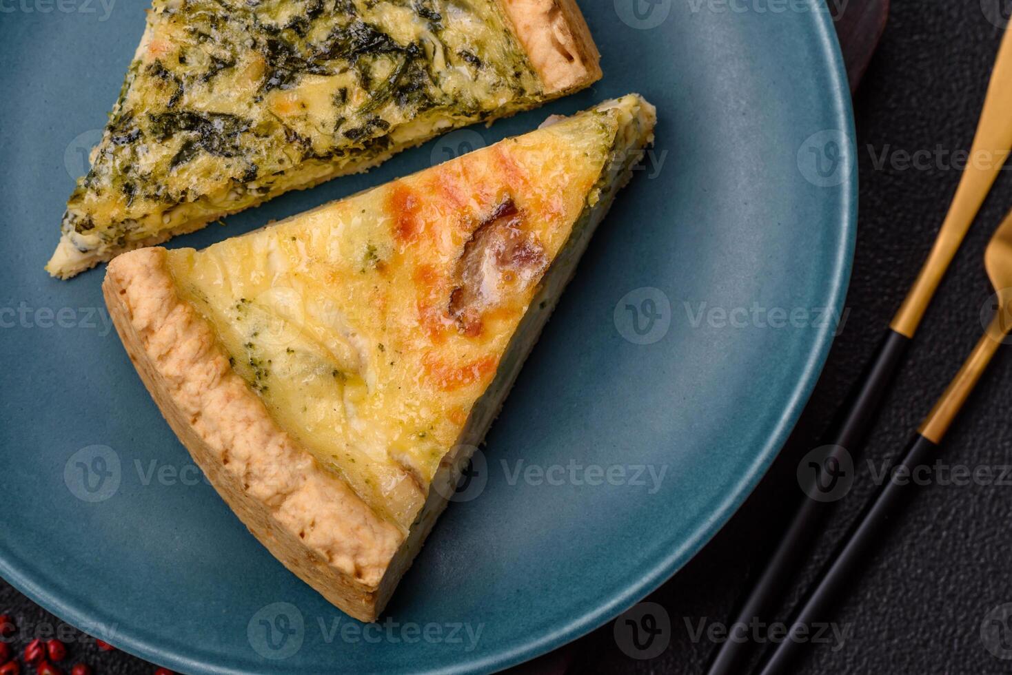 Delicious crispy quiche cut into slices with cheese, broccoli, tomatoes photo