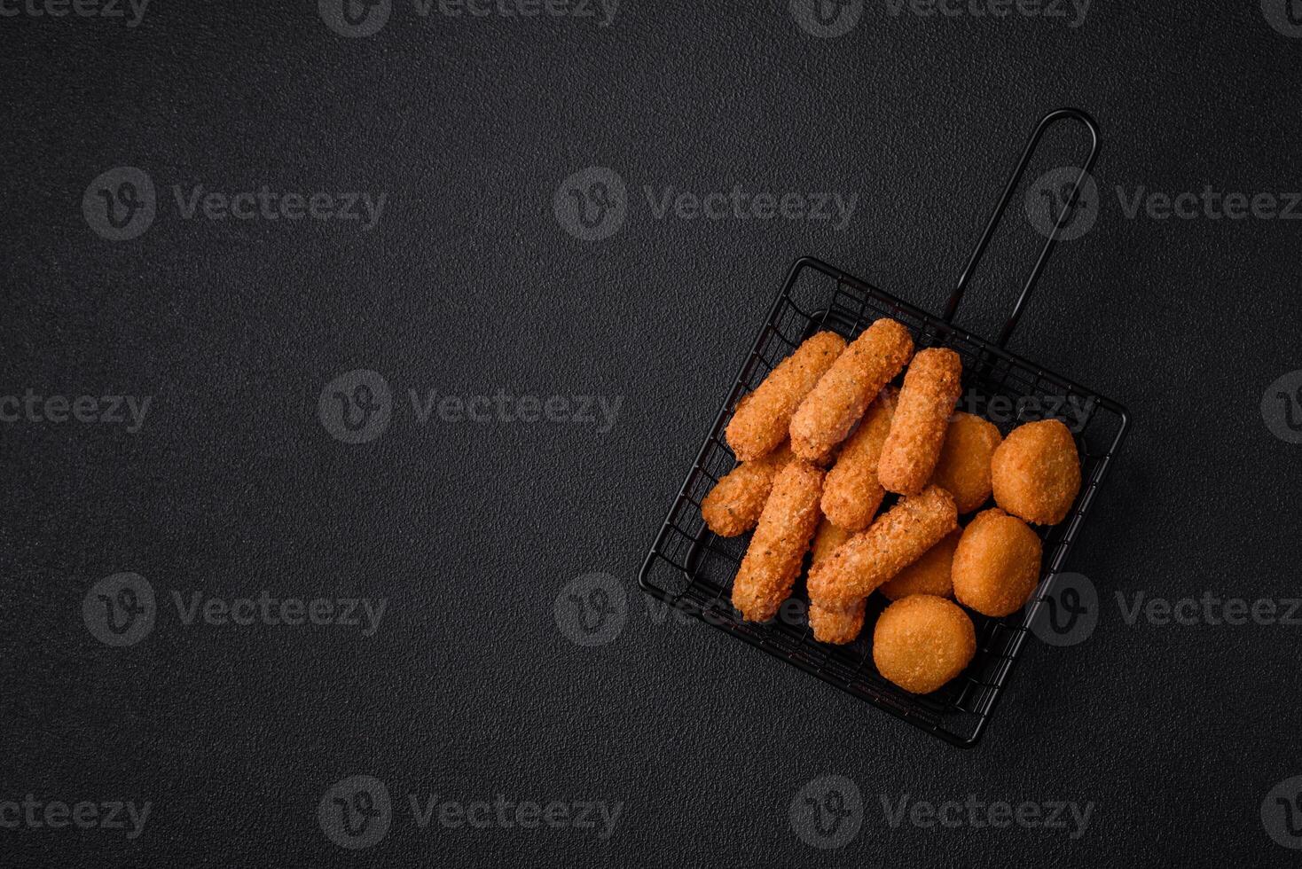 Delicious nuggets, rings and balls of mozzarella and parmesan cheese photo