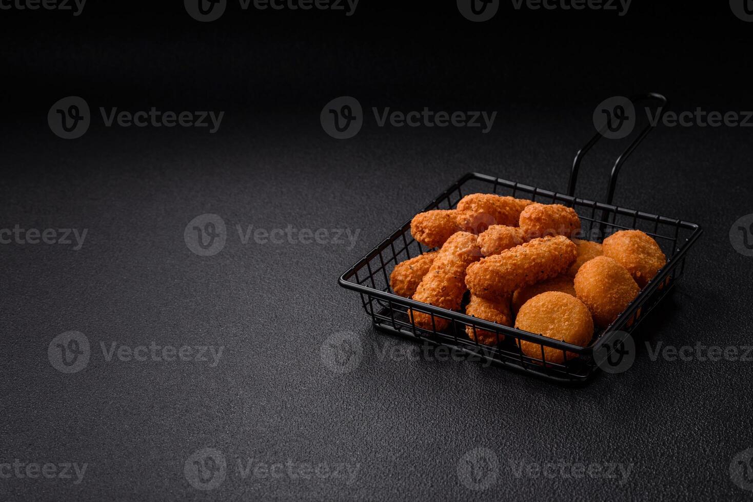 Delicious nuggets, rings and balls of mozzarella and parmesan cheese photo