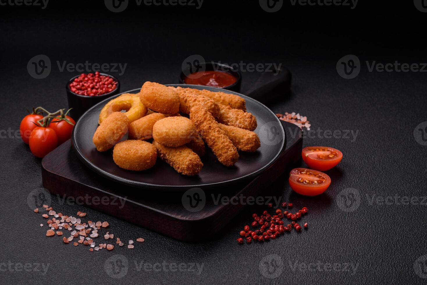 Delicious nuggets, rings and balls of mozzarella and parmesan cheese photo