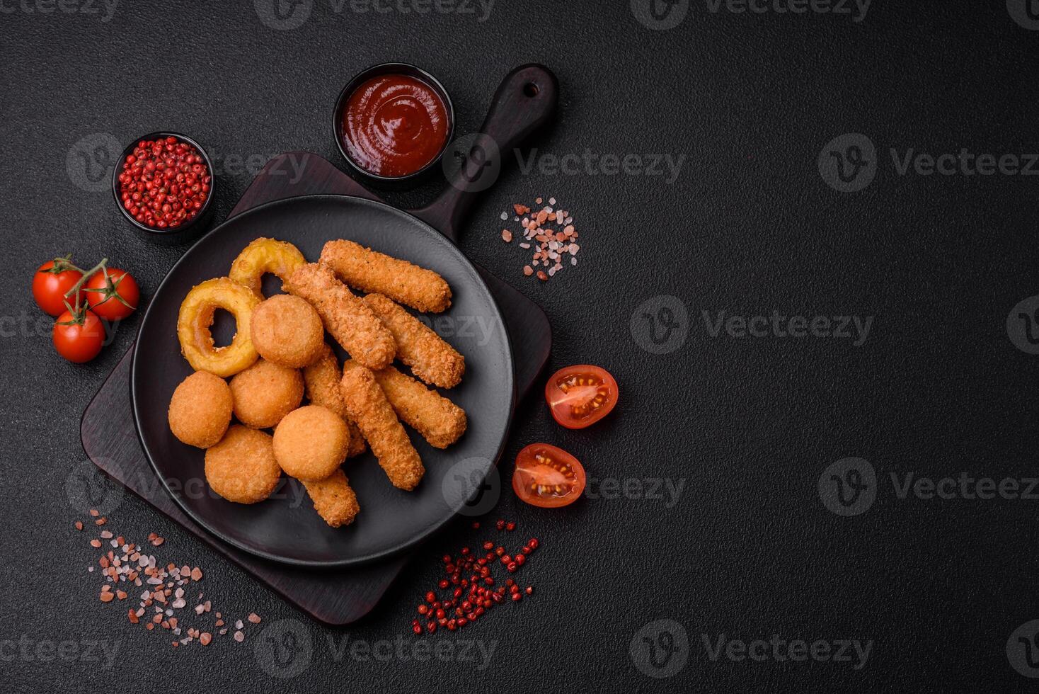 Delicious nuggets, rings and balls of mozzarella and parmesan cheese photo