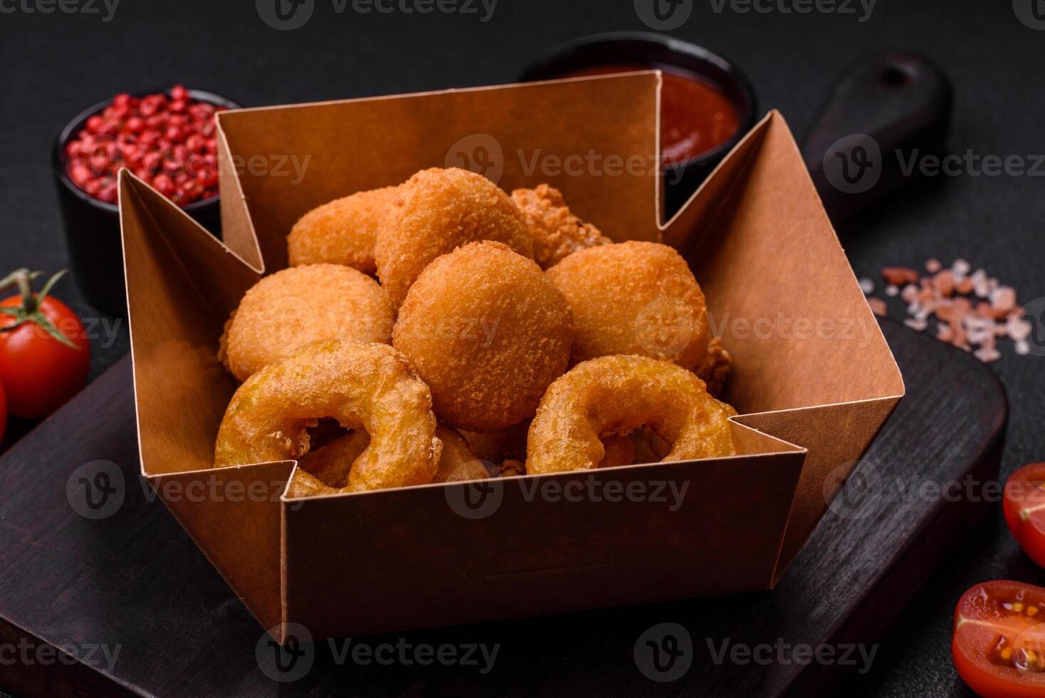 Delicious nuggets, rings and balls of mozzarella and parmesan cheese photo