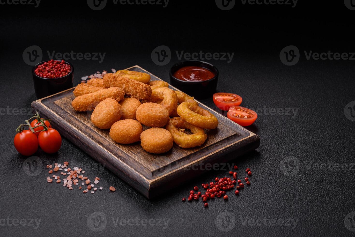 Delicious nuggets, rings and balls of mozzarella and parmesan cheese photo