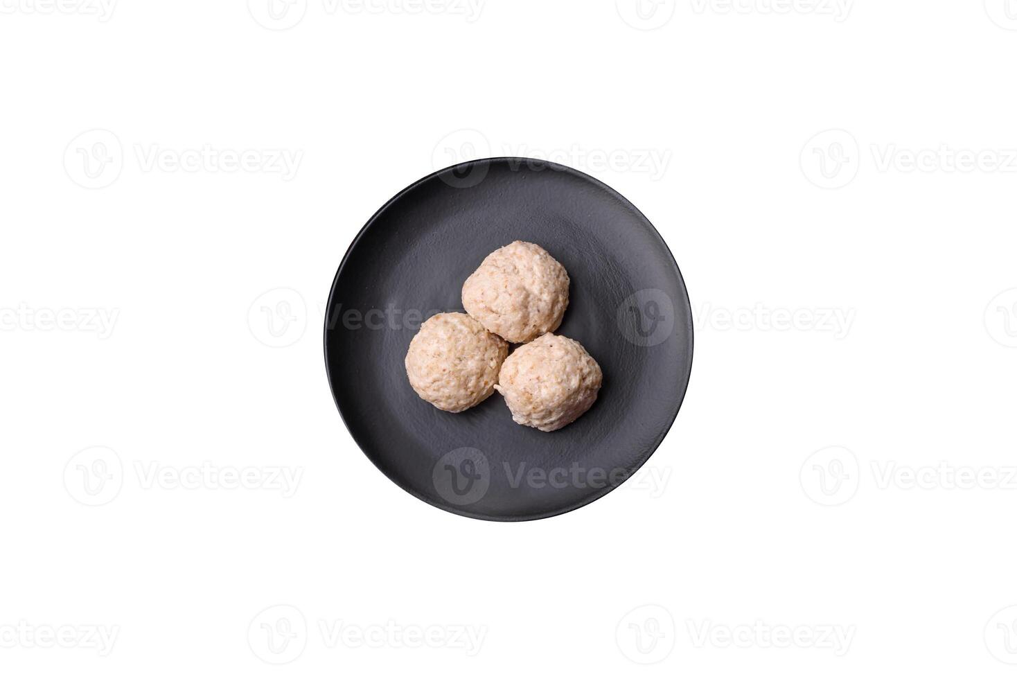 Delicious healthy steamed chicken cutlets or minced meatballs photo
