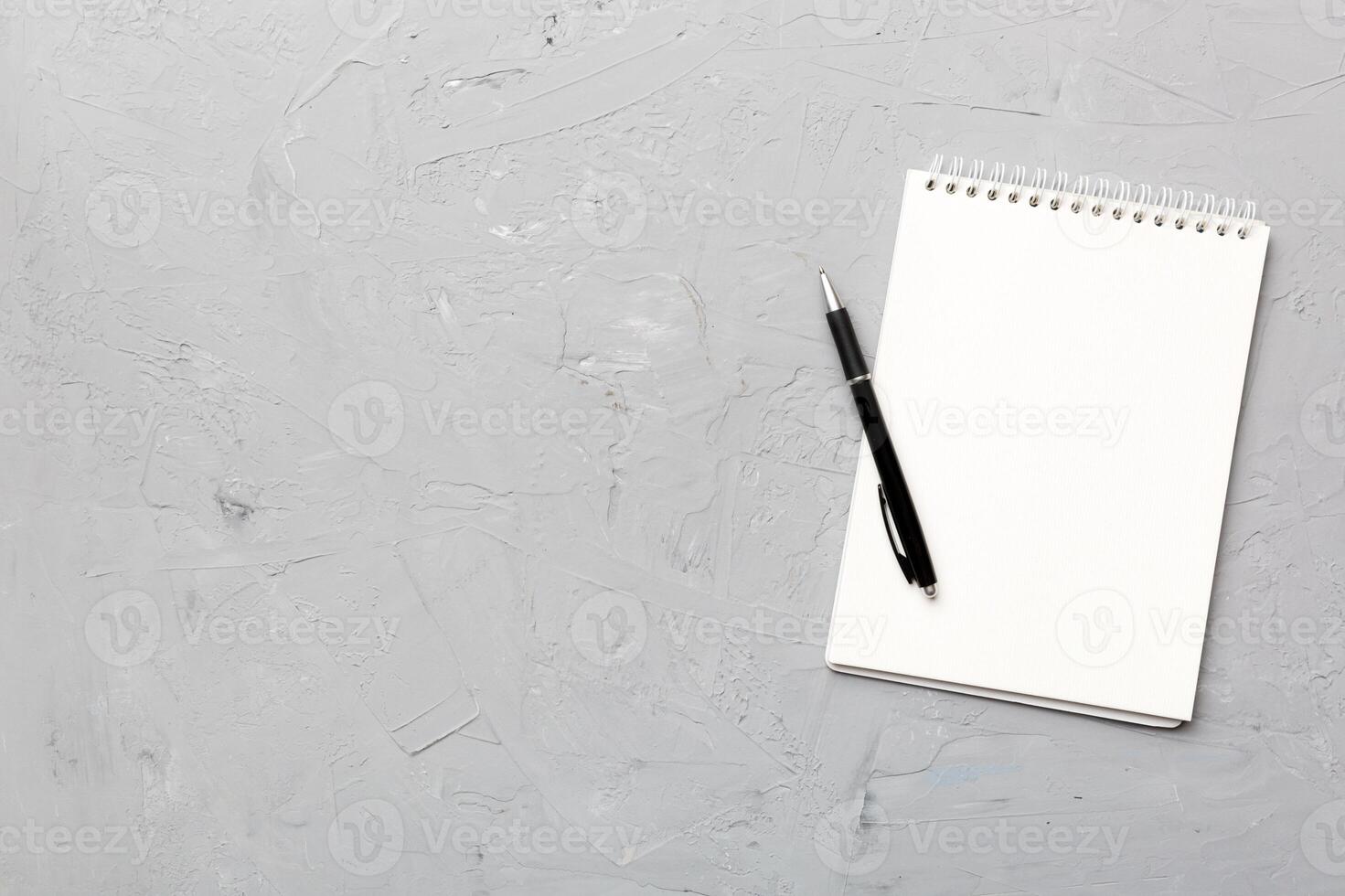 Blank notebook with pen on white background. Back to school and education concept photo