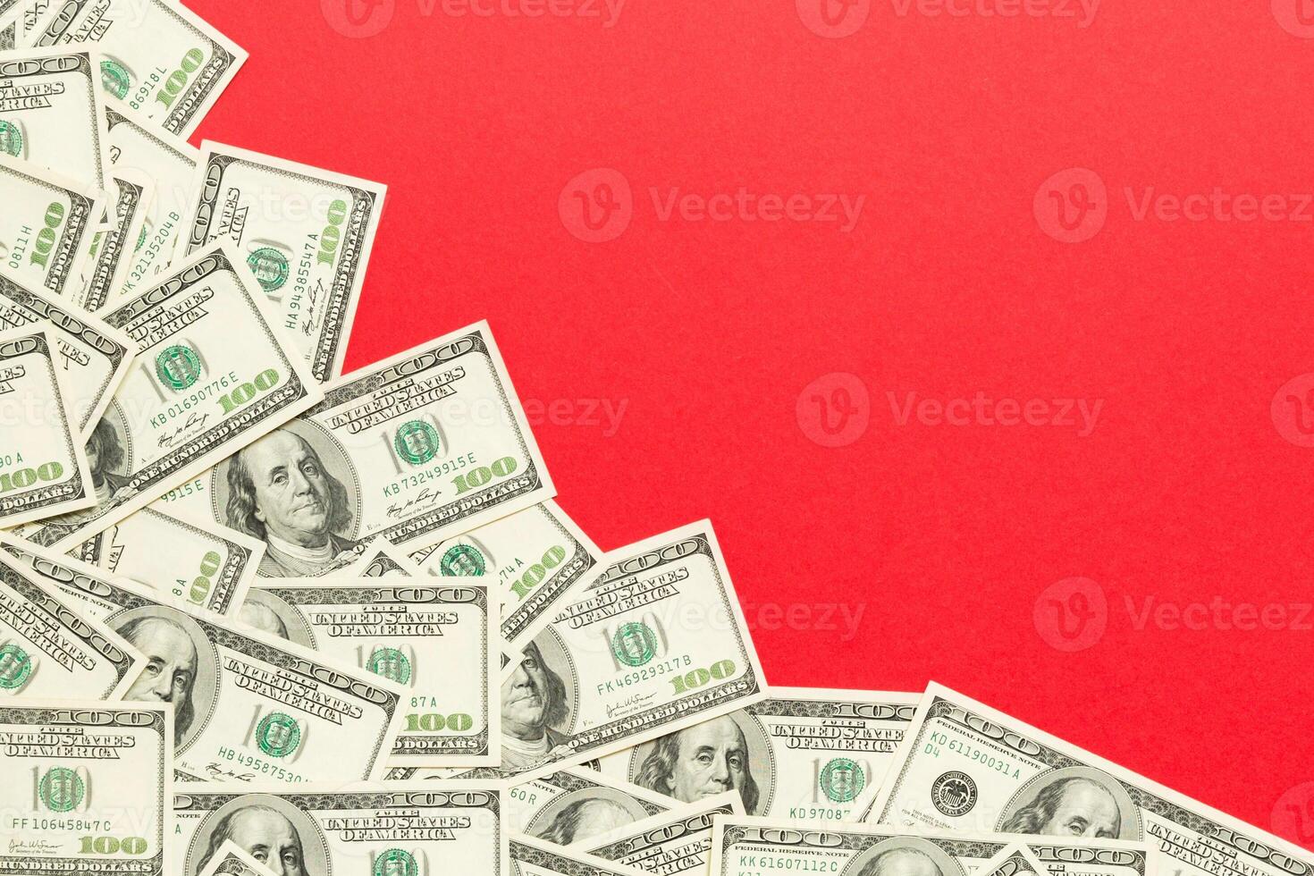 One hundred dollar banknotes on colored background top view, with empty place for your text business money concept. One hundred dollar background. photo