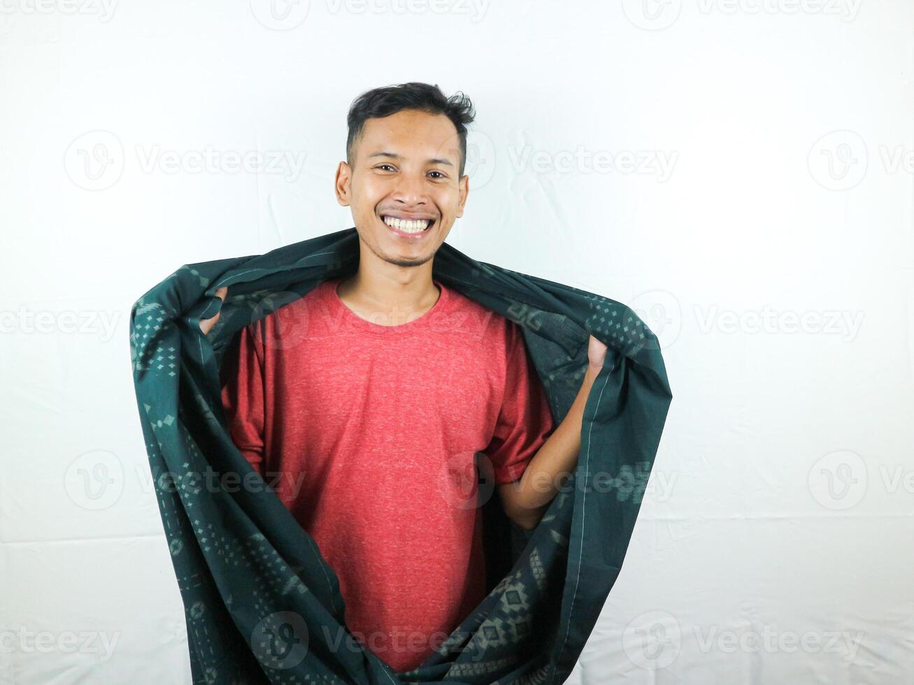 gestures and smiling face expressions of cold men wrapped in blankets photo