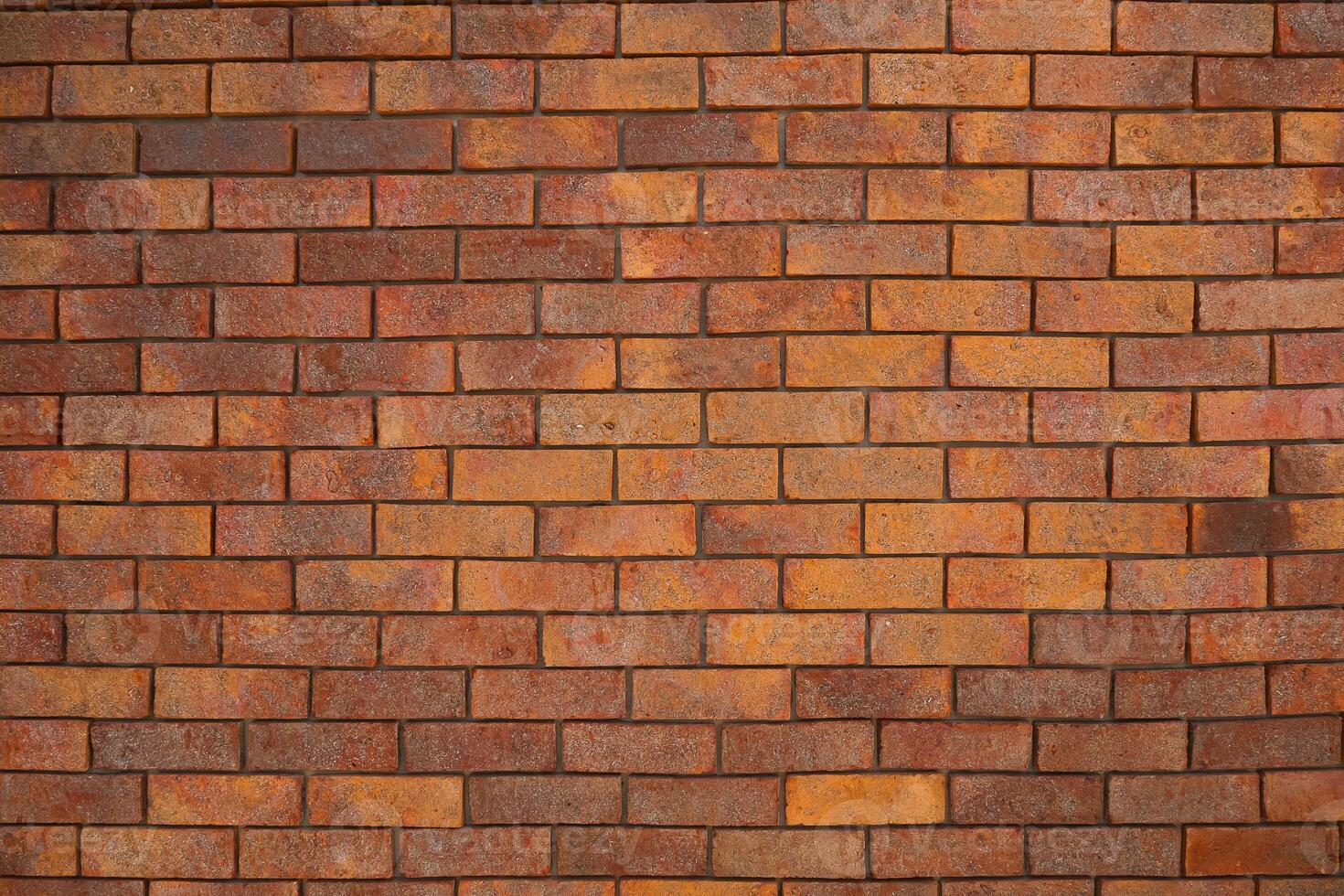 Red Textured Brick Wall Background with Old Cement Blocks and Brown Stone Pattern in Exterior Construction Architecture photo