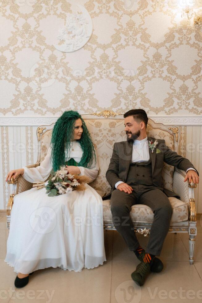 meeting of the bride and groom in the hotel photo