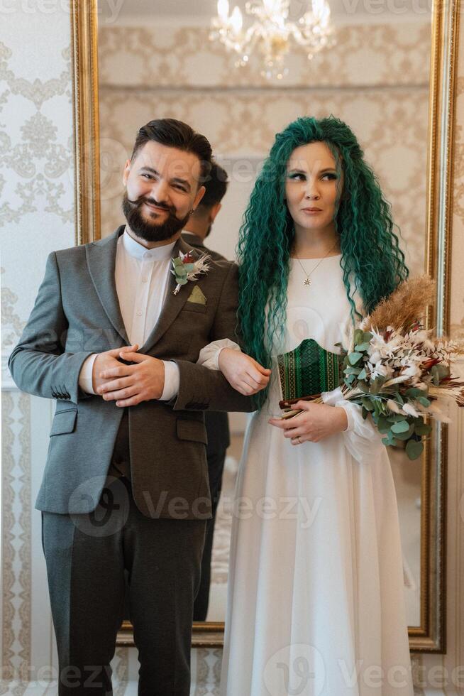 meeting of the bride and groom in the hotel photo