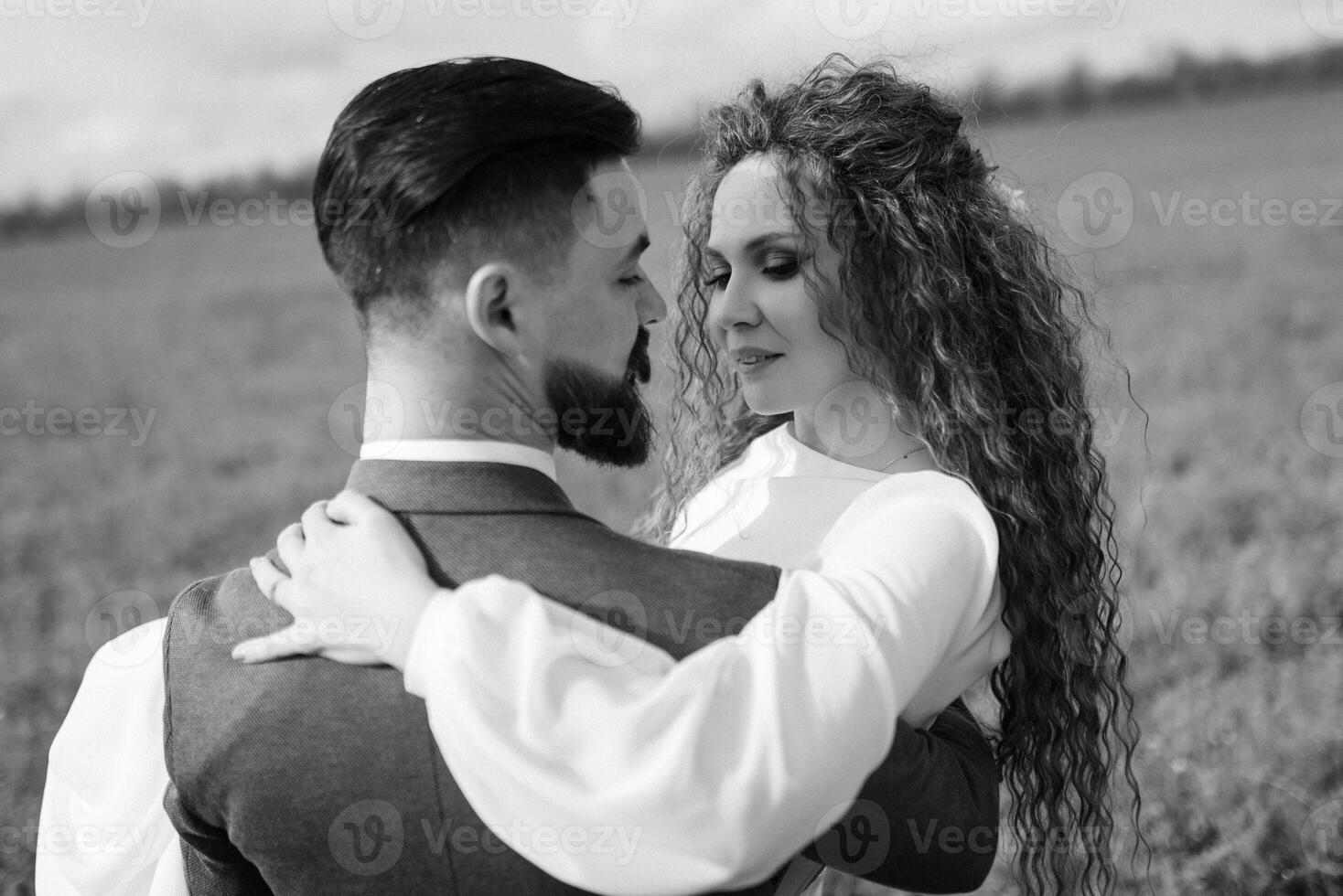 a bearded groom and a girl with green hair dance and twirl photo