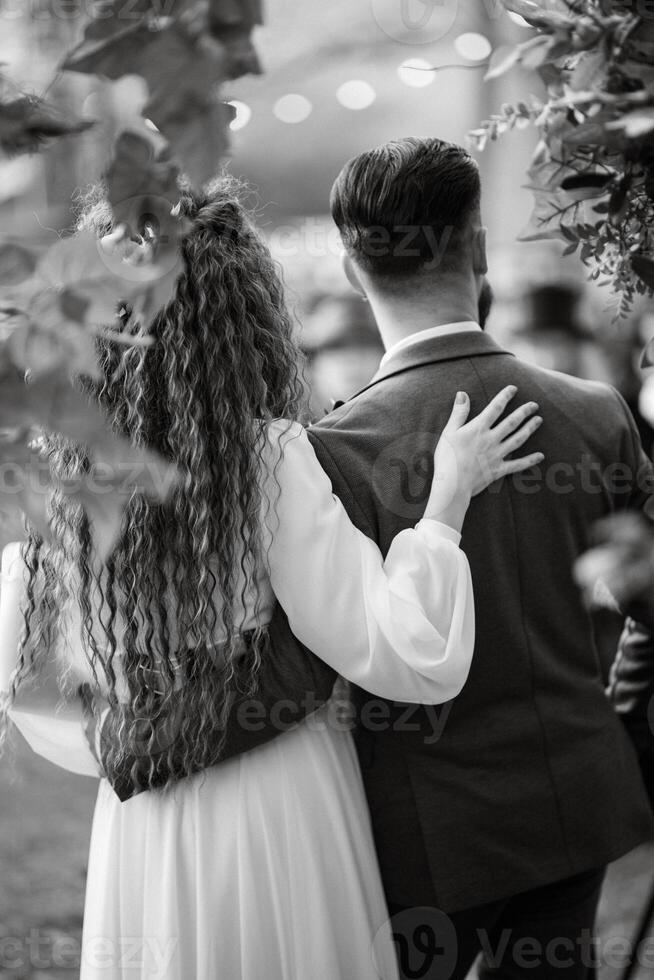 wedding ceremony of the newlyweds in a country cottage photo