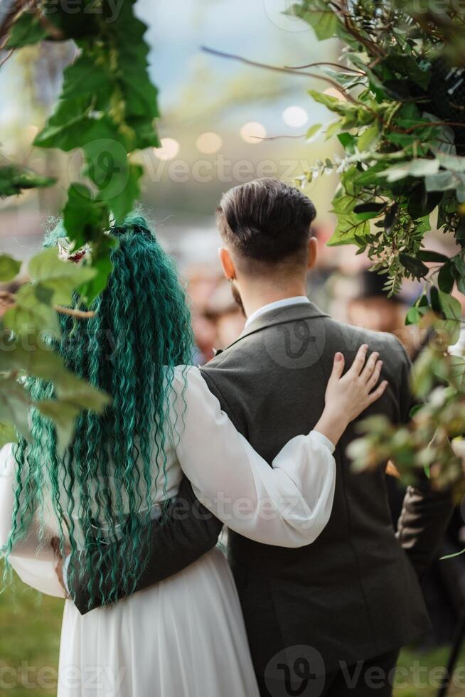 wedding ceremony of the newlyweds in a country cottage photo