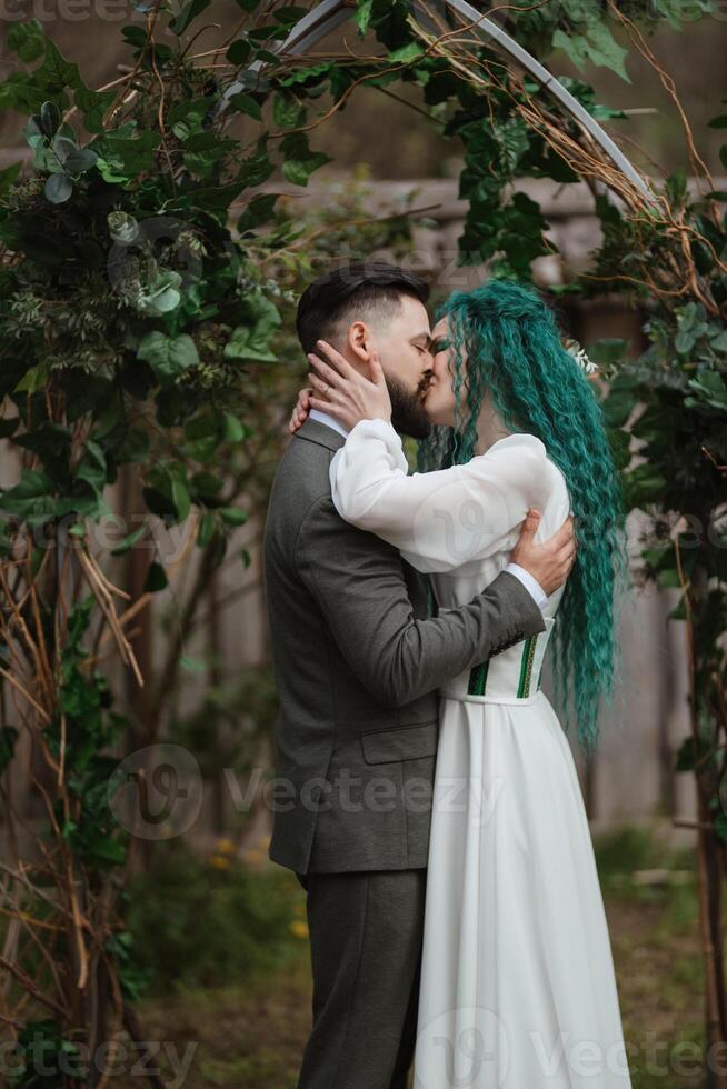 wedding ceremony of the newlyweds in a country cottage photo