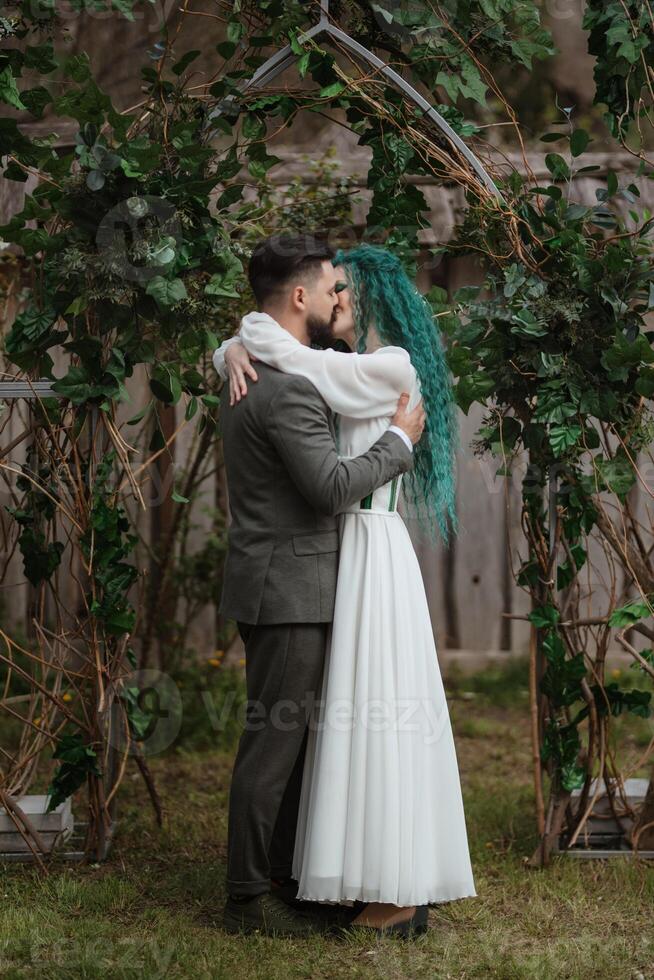 wedding ceremony of the newlyweds in a country cottage photo