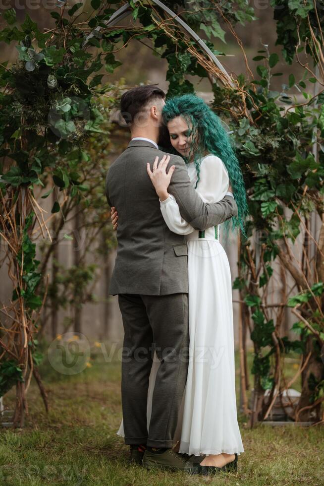 wedding ceremony of the newlyweds in a country cottage photo