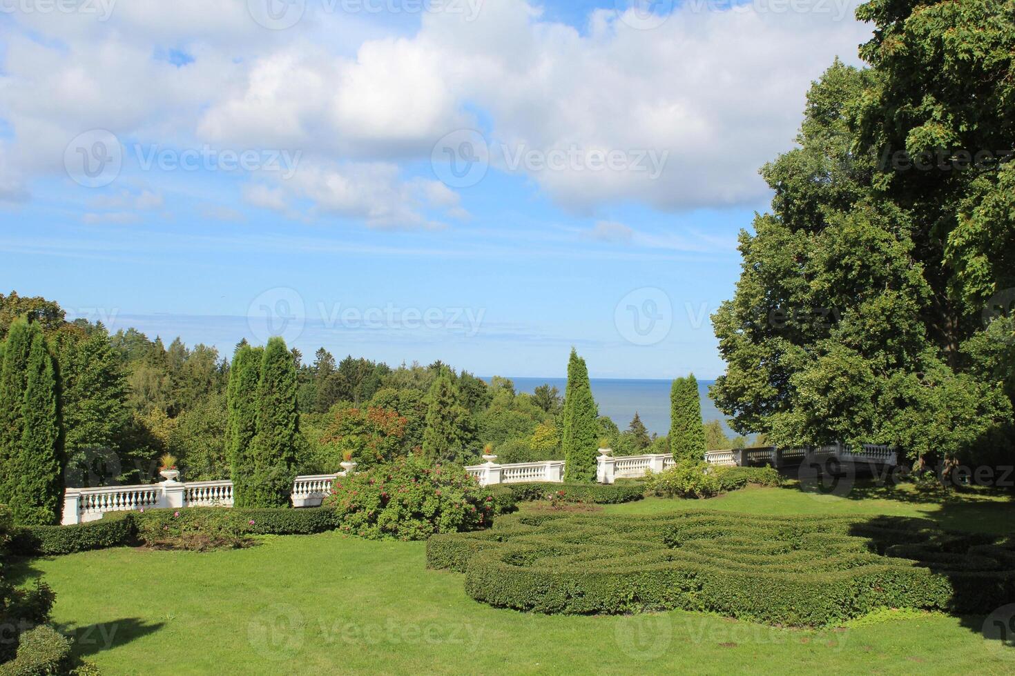 Park alley with flowerpots. Toila-Oru park in Estonia. photo