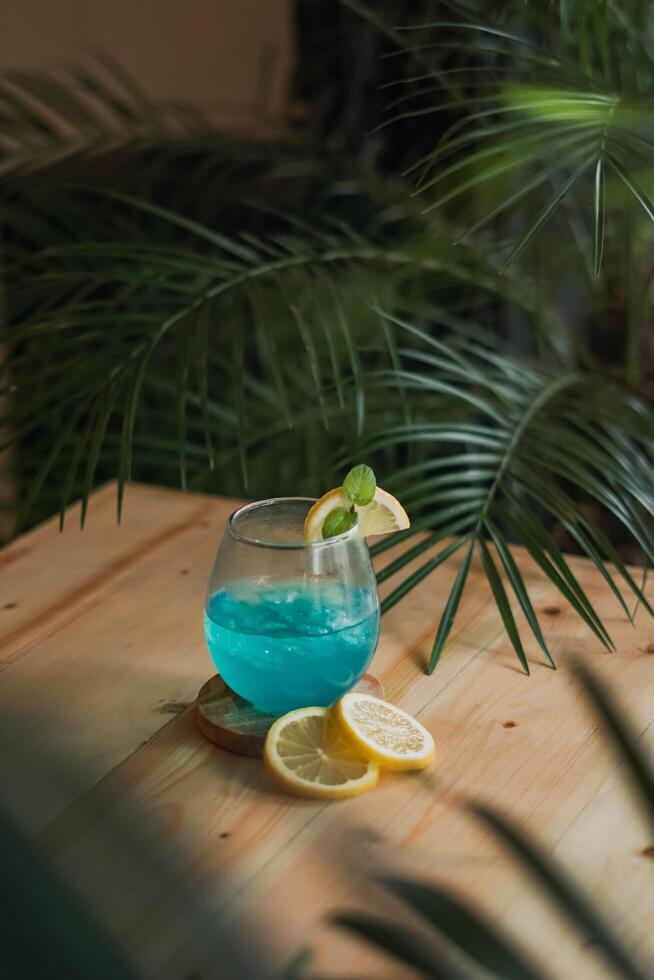 blue and red cocktails with lime for summer drinks photo