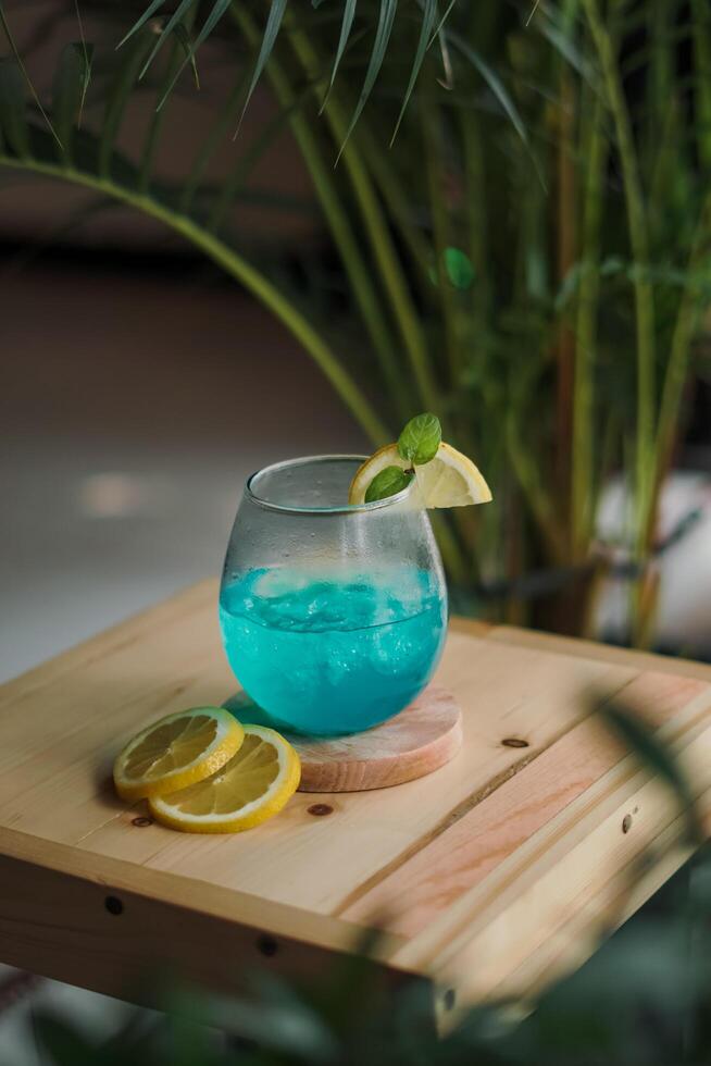 blue and red cocktails with lime for summer drinks photo