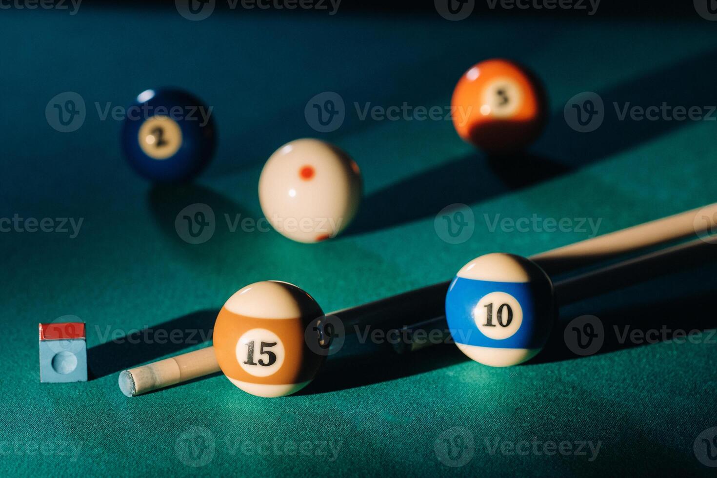 Billiard table with green surface and balls in the billiard club.Pool Game photo