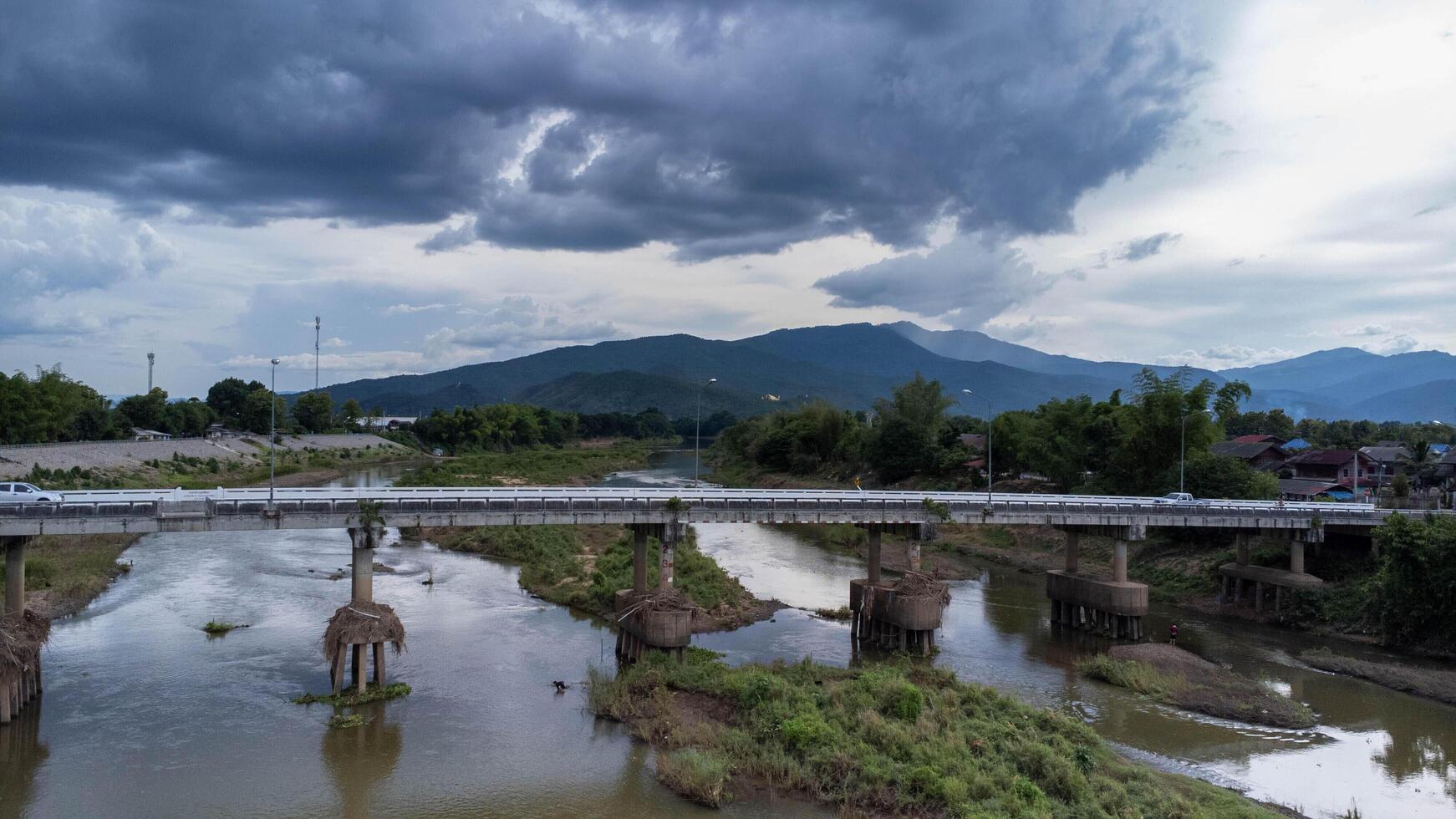 The Bridge over the Ping River. Aerial view of the traffic on the bridge over the river. photo
