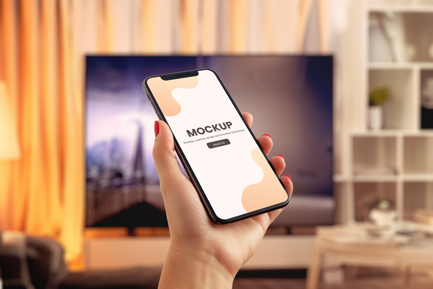Phone mockup in hand front of TV psd