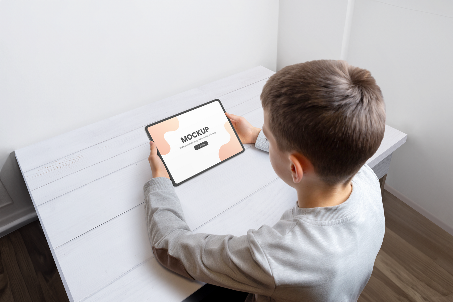 Boy hold tablet mockup for game or app psd