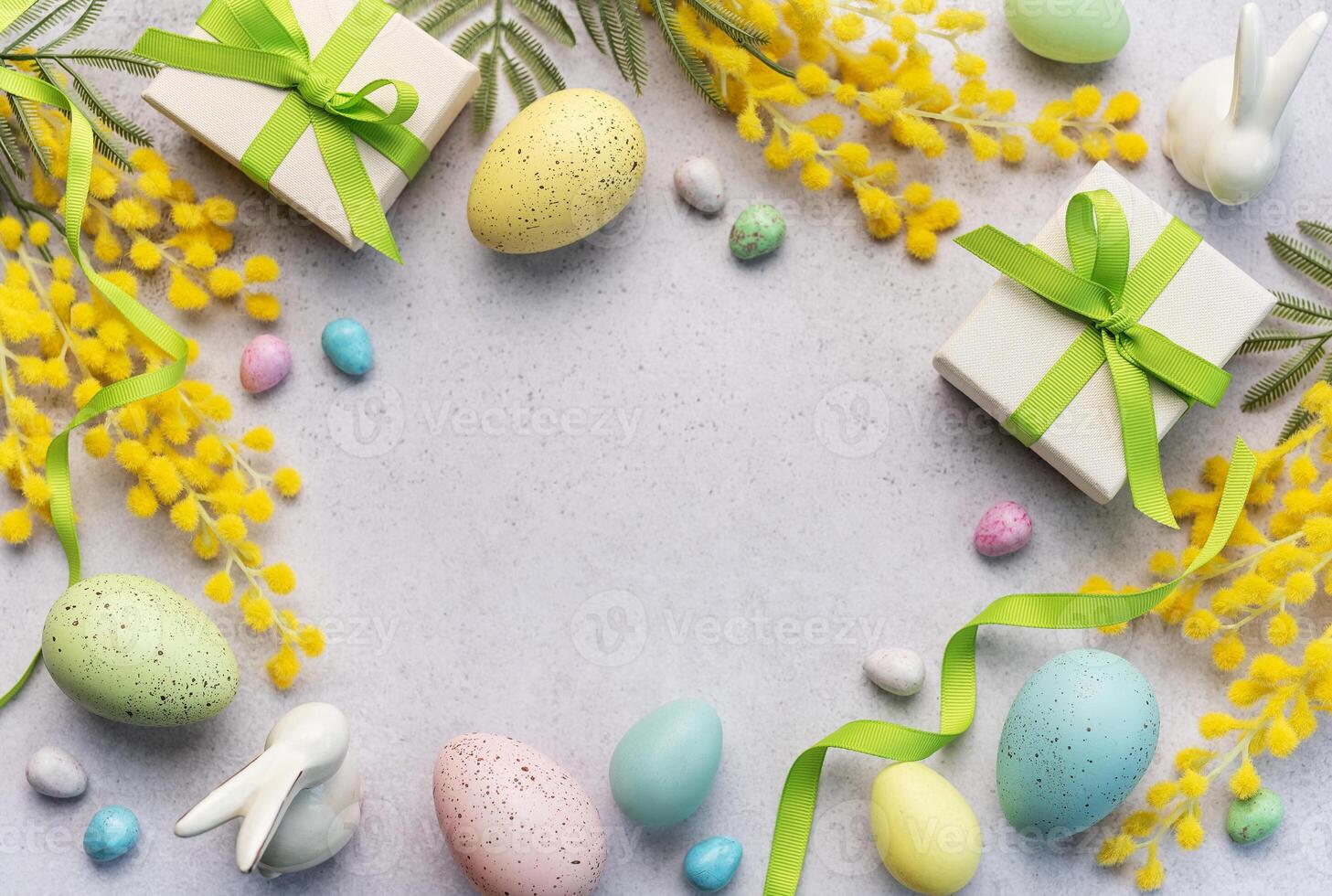 Festive Easter Celebration With Decorated Eggs and Gifts on a Light Background photo