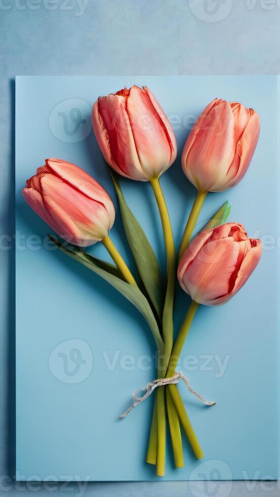 AI generated Photo Of Top View Tulip Flowers On Light Blue Blank Paper Background  Mothers Day Concept Feminine Concept. AI Generated
