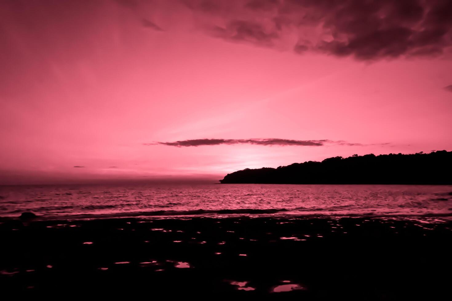 Tropical beach at beautiful sunset over the sea as Summer nature pink background photo