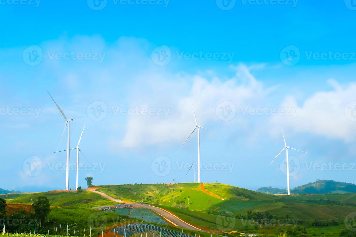 Wind turbines on the mountain of nature on blue sky at Khao Kho, Phetchabun, Thailand photo