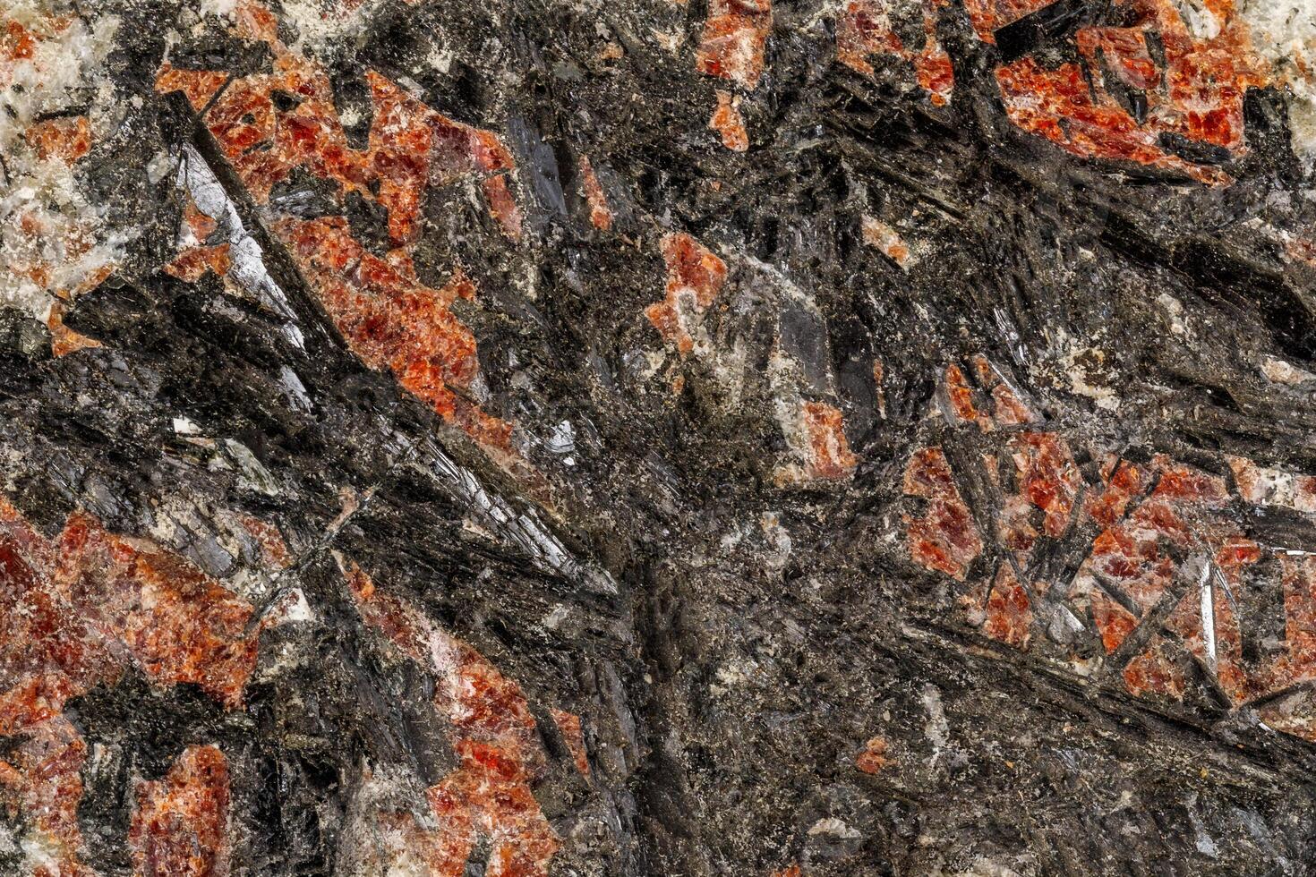 Macro of a stone Stibnite mineral on a white background photo