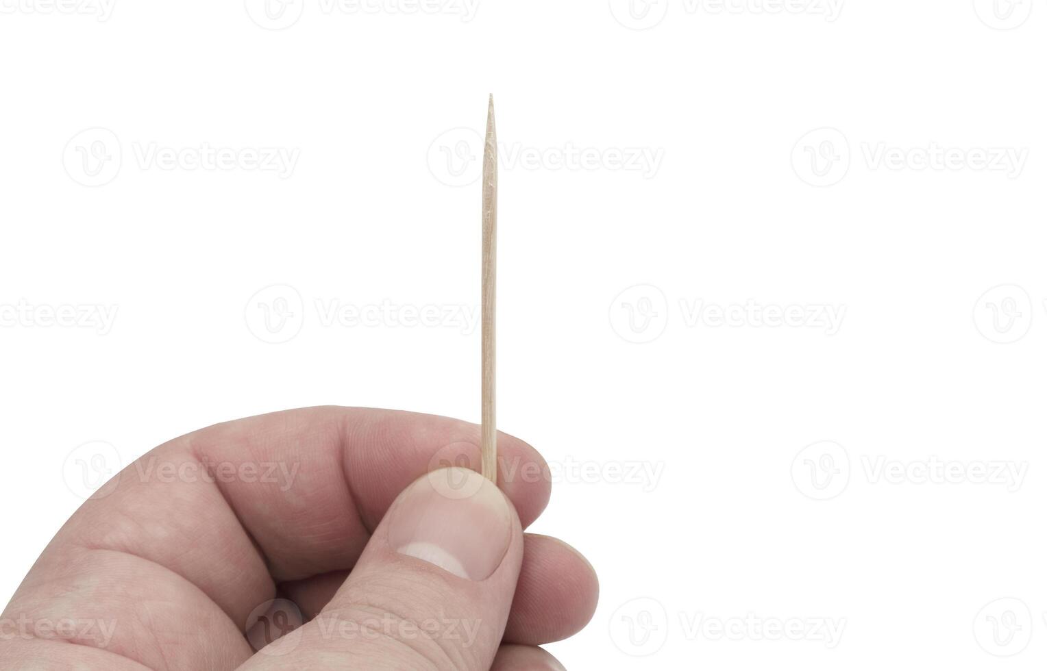 Hand holding toothpick isolated on white background. photo