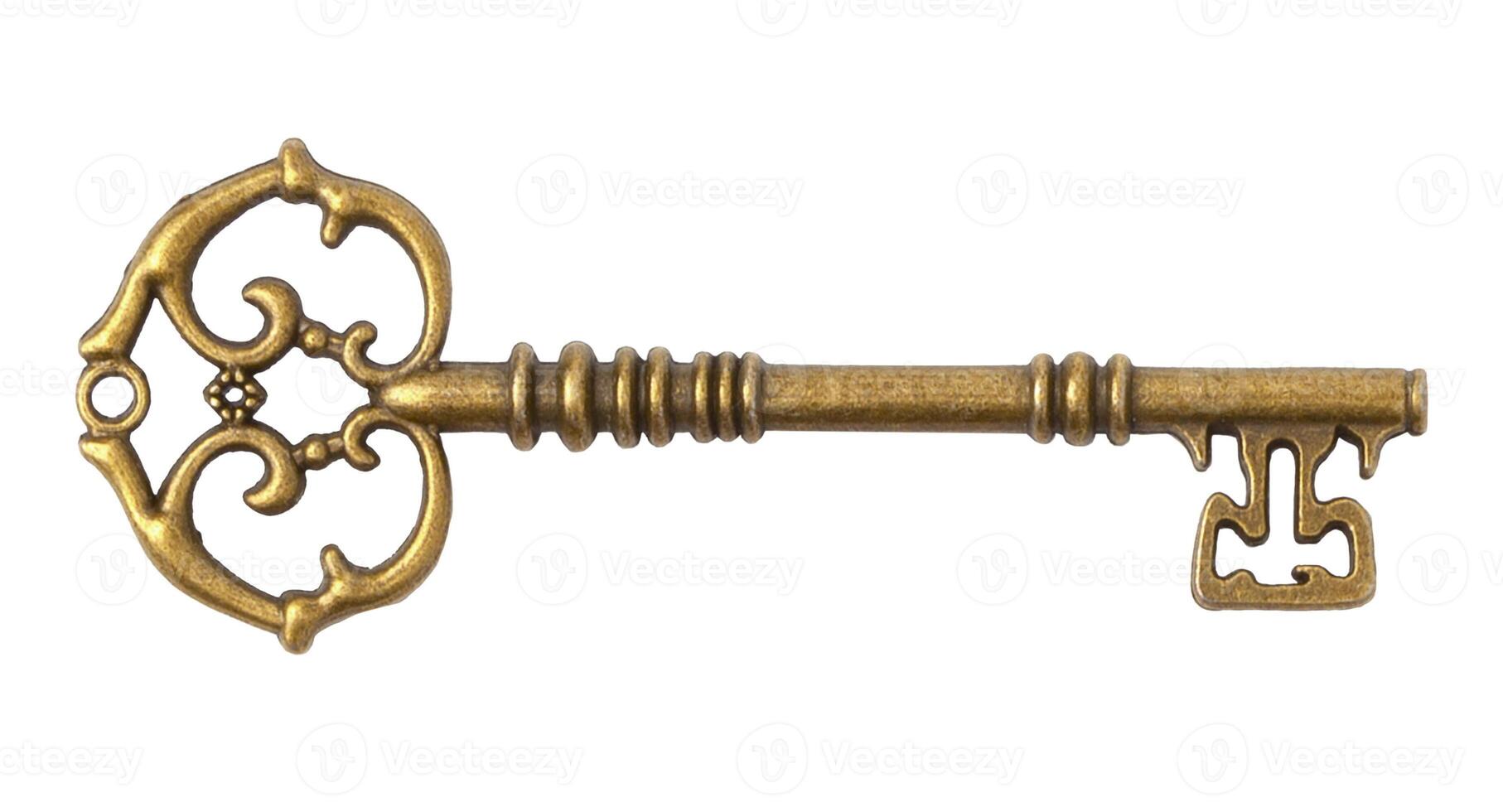 Bronze vintage key. Isolated on a white background. photo