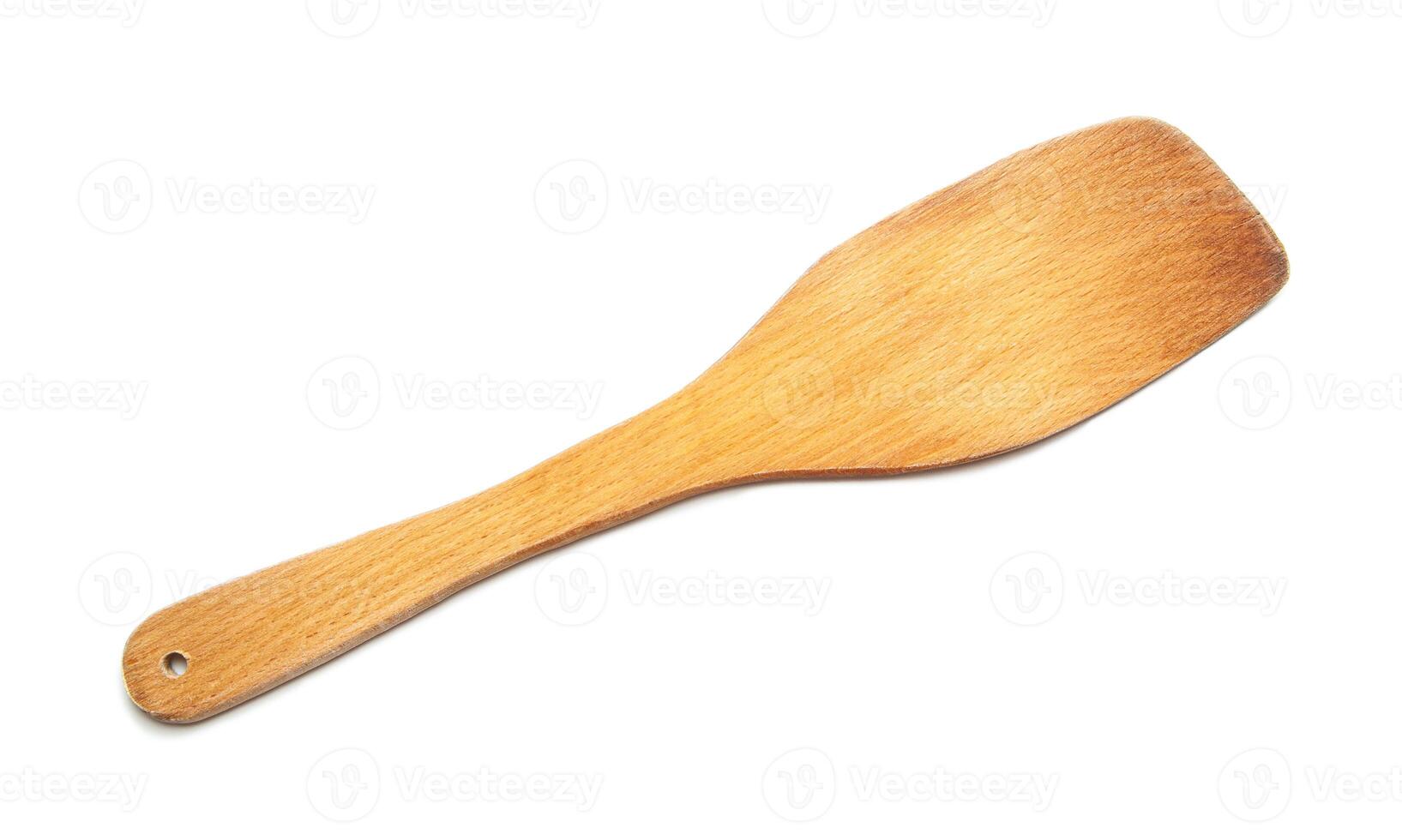 Wooden shovel isolated on white background photo