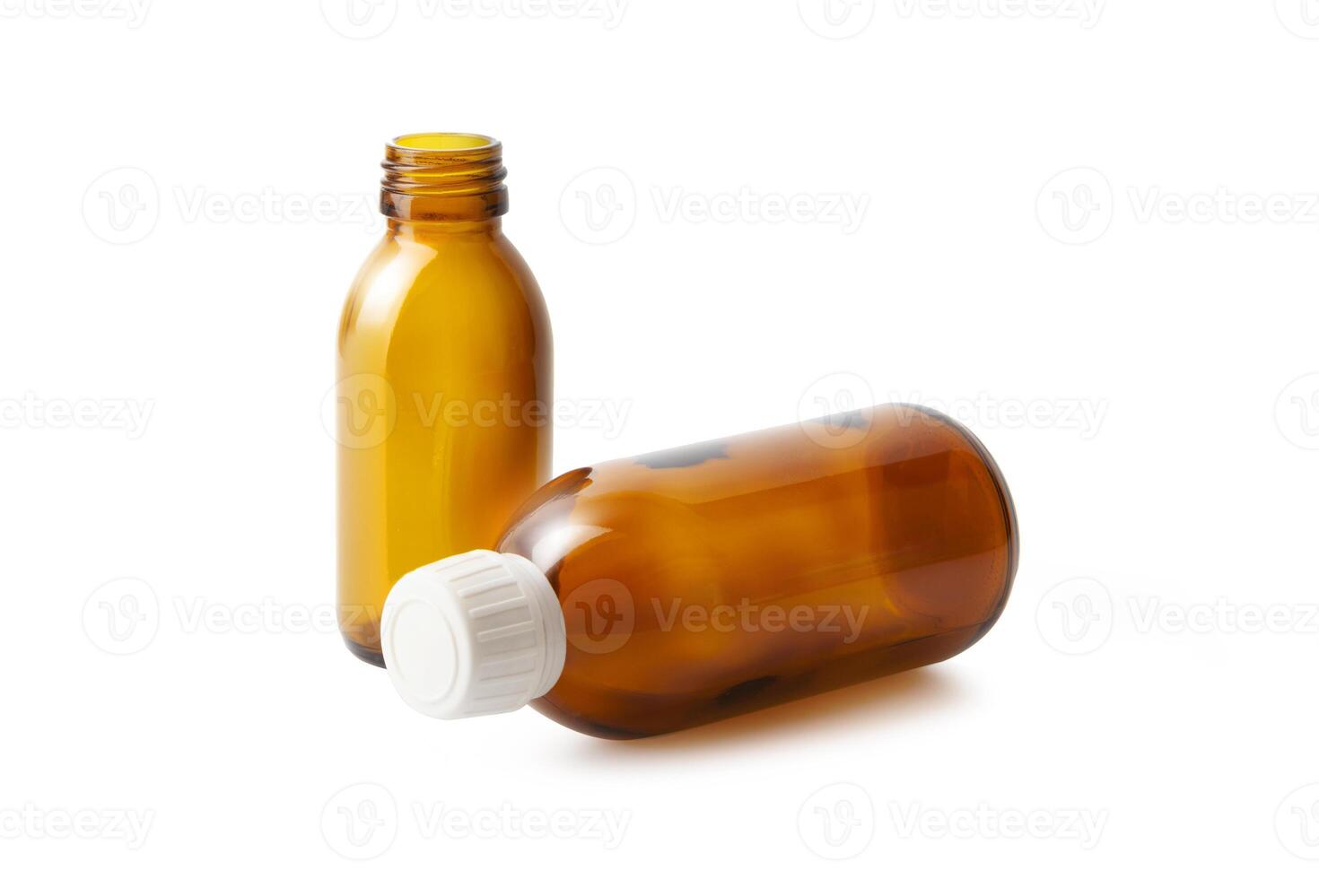 Two medicine bottles close up isolated on white photo